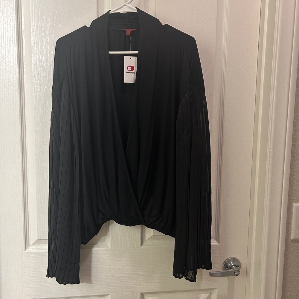 BUCKLE bell sleeve top